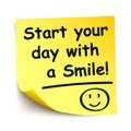 Yellow sticker with black postit Ã¢â¬Å¾Start your day with a smile!!!Ã¢â¬Å, note hand written - vector